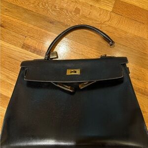 Elegant Black Leather Hermes Kelly authentic Handbag